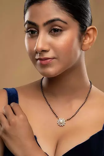 white silver mangalsutra with beaded gold pendant chain
