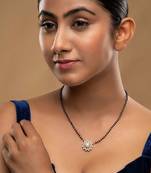 white silver mangalsutra with beaded gold pendant chain
