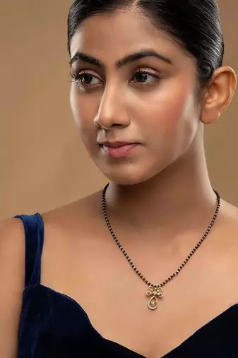 white silver mangalsutra with black bead gold pendant chain