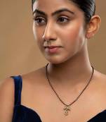 white silver mangalsutra with black bead gold pendant chain