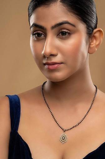 green silver mangalsutra with gold stone bead chain