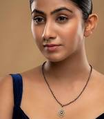 green silver mangalsutra with gold stone bead chain