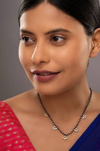 white silver mangalsutra with gold black bead pendant
