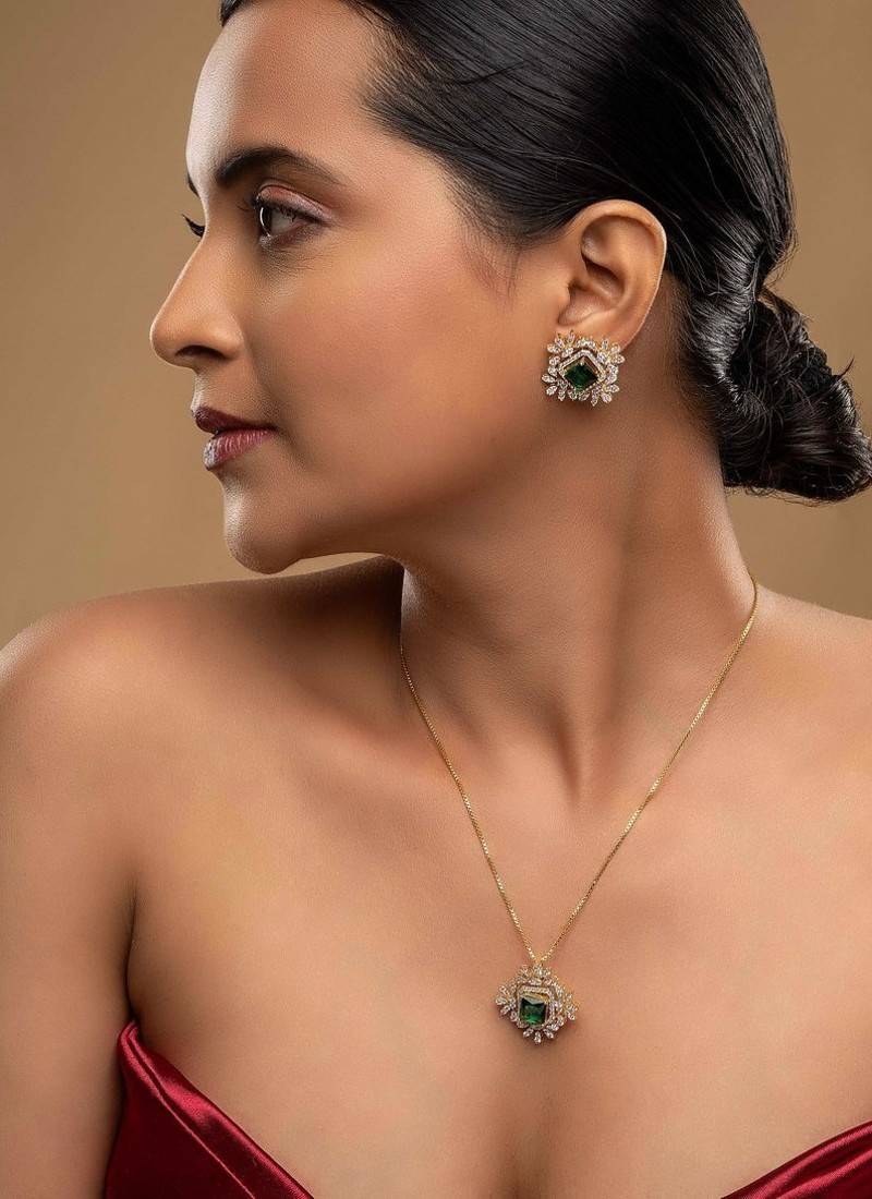 green silver necklace set with gold plated pendant