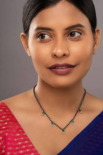 green silver mangalsutra with gold green stone pendant