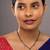 green silver mangalsutra with gold green stone pendant