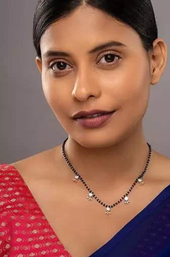 white silver mangalsutra with black bead gold locket chain