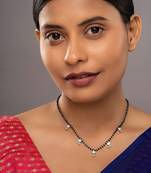 white silver mangalsutra with black bead gold locket chain