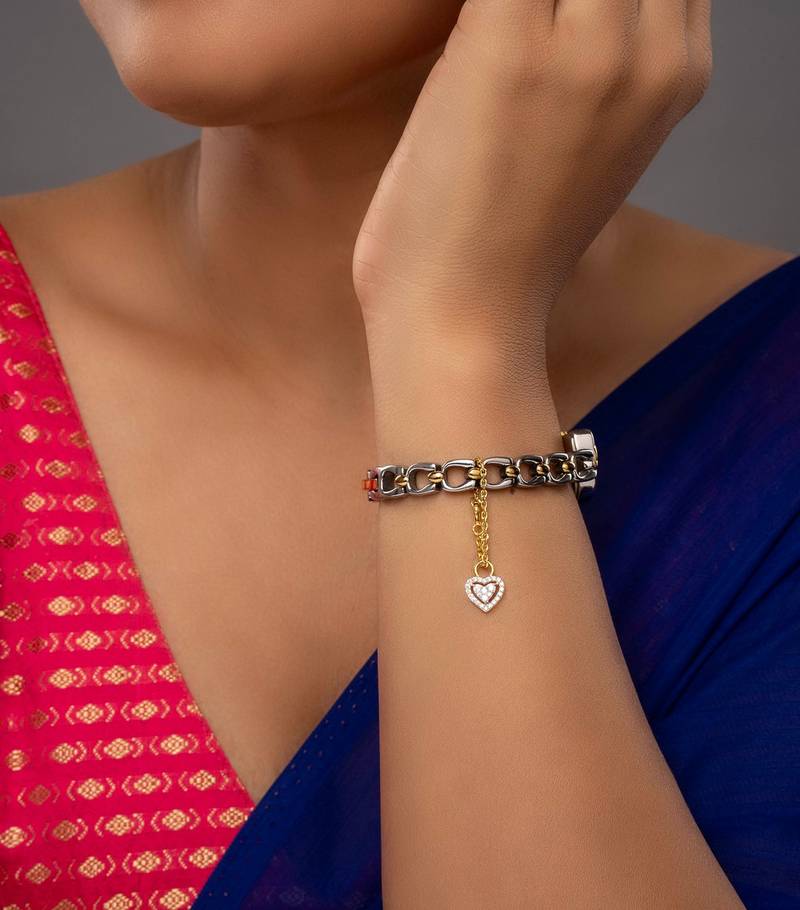Gold plated watch charm in sterling silver