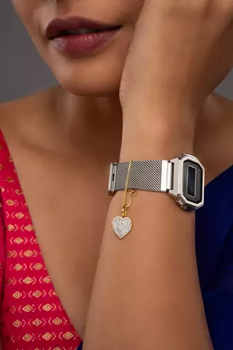 white silver watch charm with gold plated design