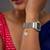 white silver watch charm with gold plated design