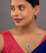 green silver pendant necklace with gold plated design