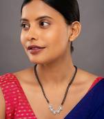 white silver mangalsutra with beaded chain gold pendant