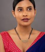 white silver mangalsutra with black bead chain work