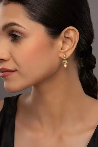 white silver jhumka earrings with gold plated detailing