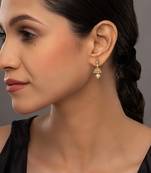 white silver jhumka earrings with gold plated detailing
