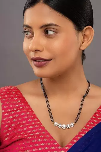 white silver mangalsutra with gold bead black chain