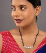 white silver mangalsutra with gold bead black chain