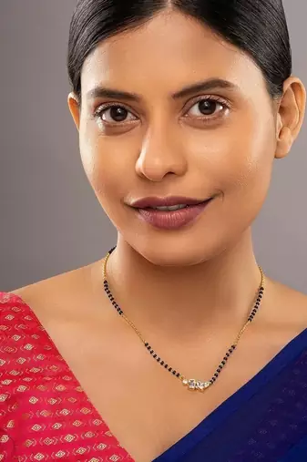 white silver mangalsutra with black beads gold locket