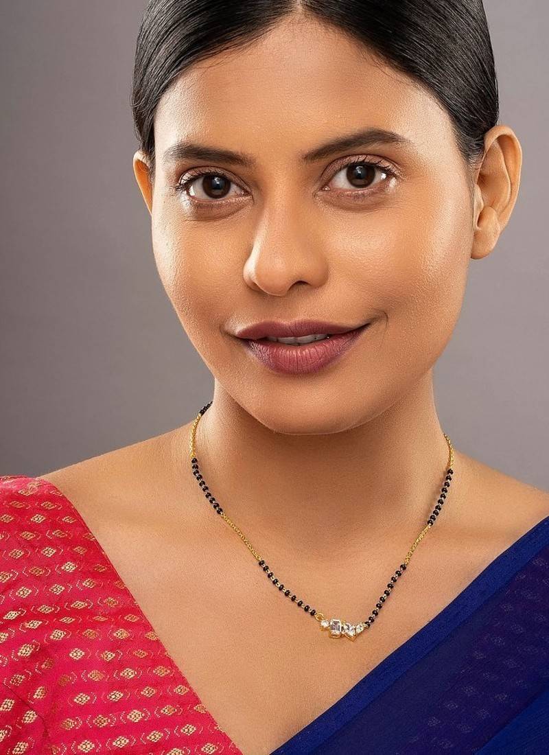 white silver mangalsutra with black beads gold locket