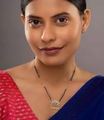 white silver mangalsutra with gold bead chain pendant