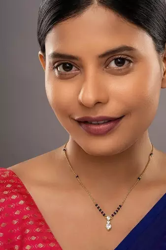 white silver mangalsutra with gold plated bead pendant