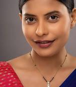 white silver mangalsutra with gold plated bead pendant