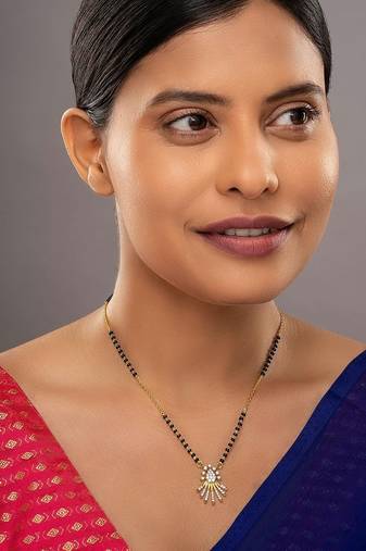 white tone silver mangalsutra with gold pendant and black beads