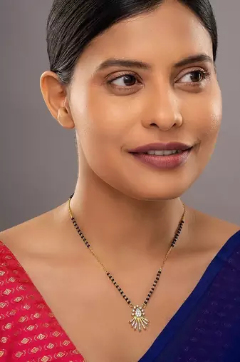 white tone silver mangalsutra with gold pendant and black beads