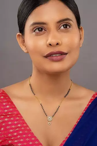 white sterling silver mangalsutra with gold pendant