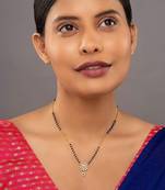 white sterling silver mangalsutra with gold pendant