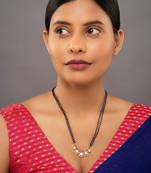 white silver mangalsutra with traditional bead work