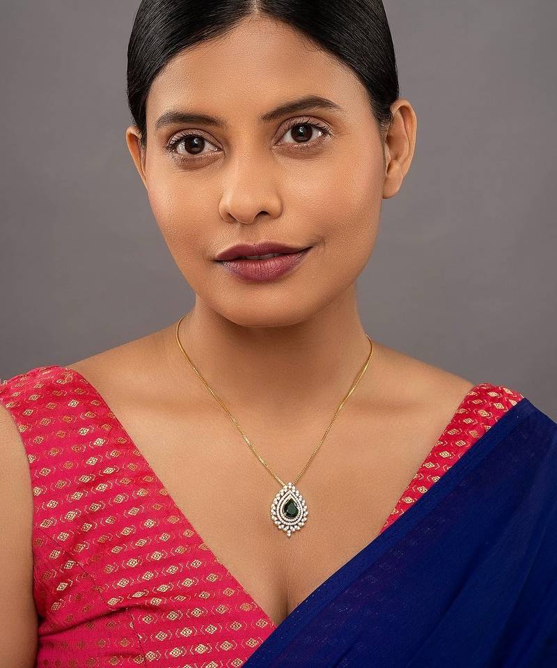 Gold plated green stone pendant necklace in sterling silver