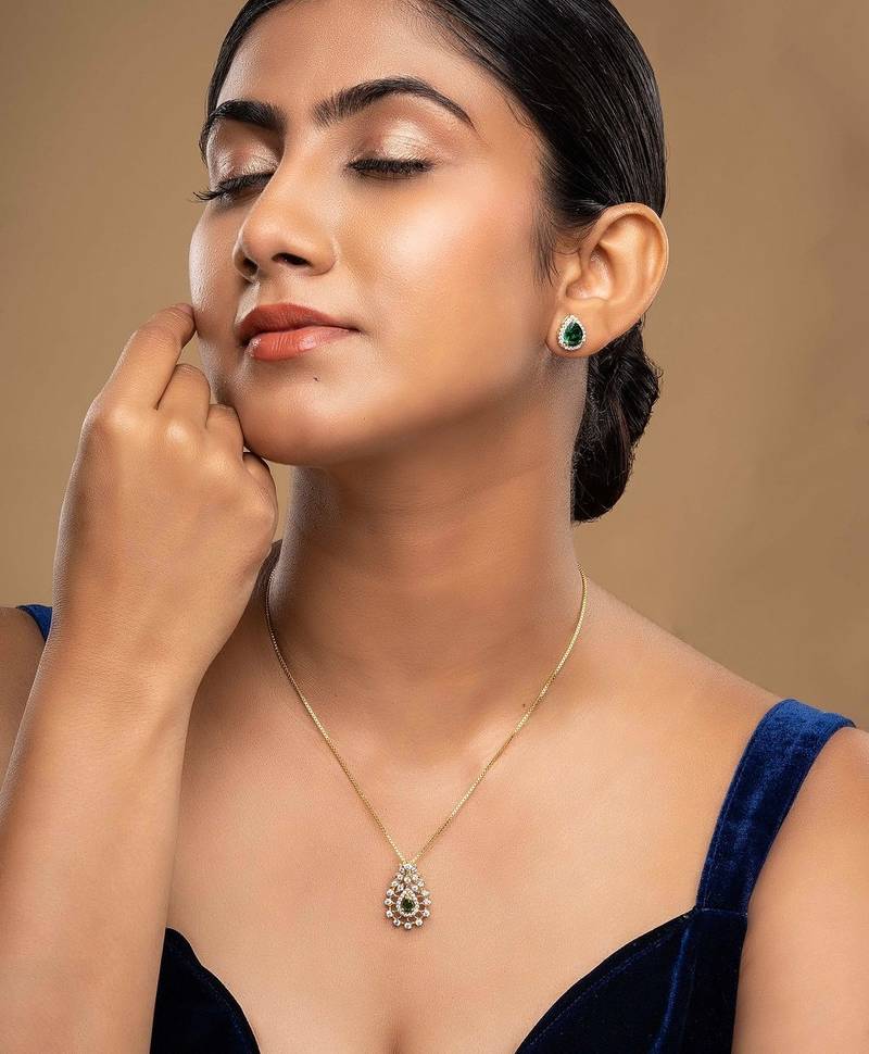 Gold plated green stone pendant necklace set in sterling silver