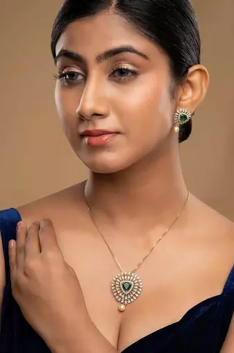 Gold plated green stone pendant necklace set in sterling silver