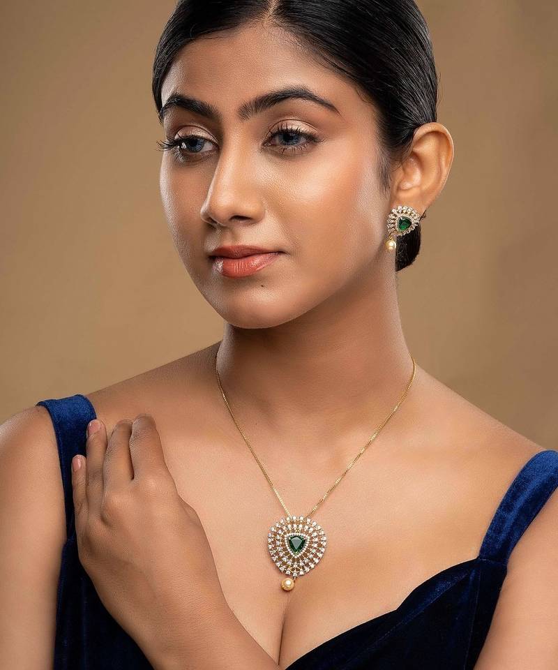 Gold plated green stone pendant necklace set in sterling silver