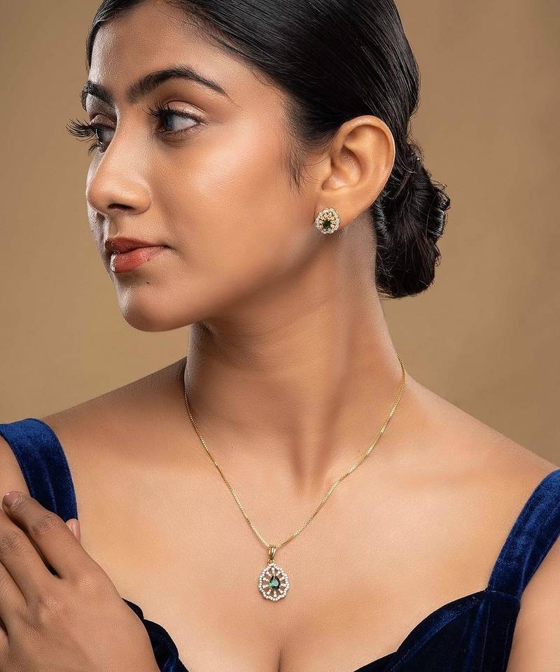 Gold plated green stone pendant necklace set in sterling silver