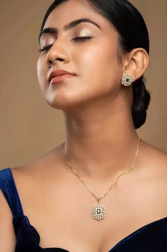 Gold plated green stone pendant necklace set in sterling silver