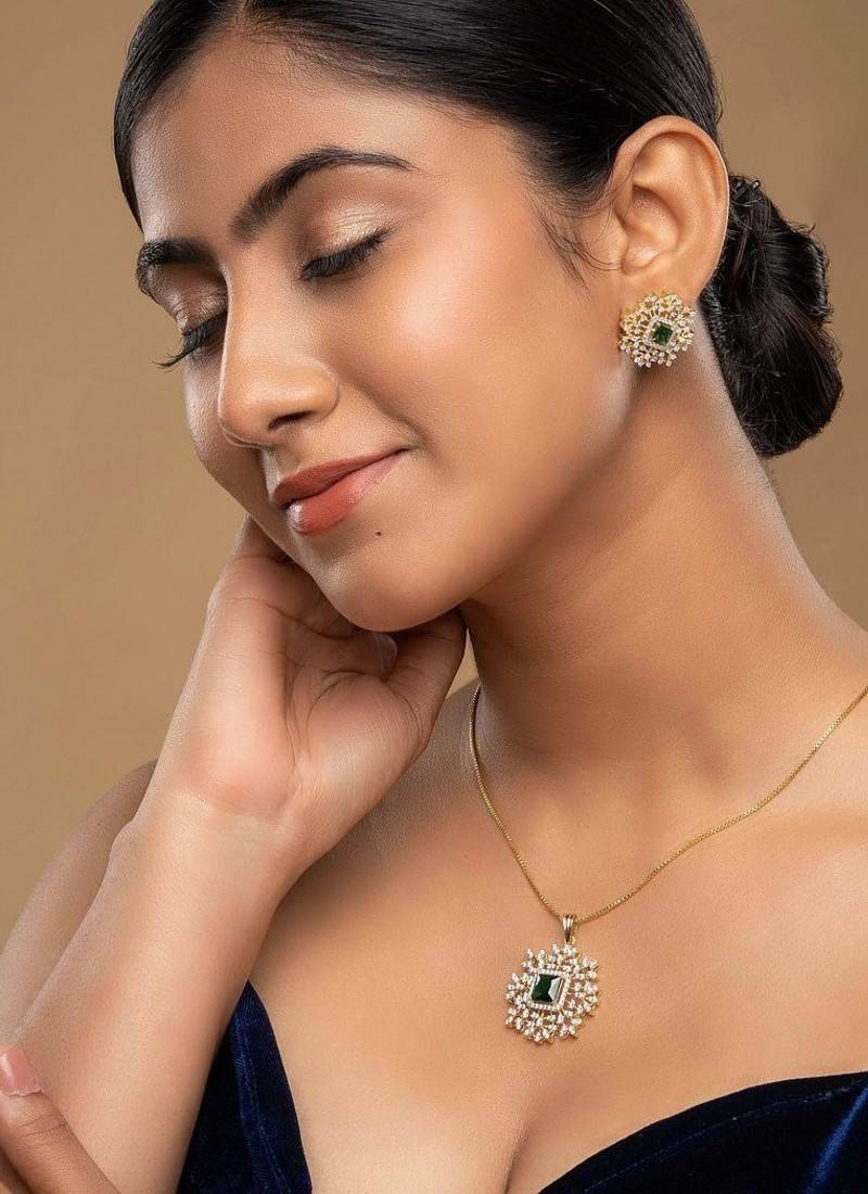 Gold plated green stone pendant necklace set in sterling silver