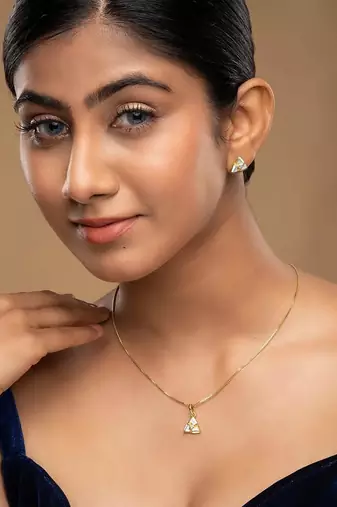 Gold plated blue stone pendant necklace set in sterling silver