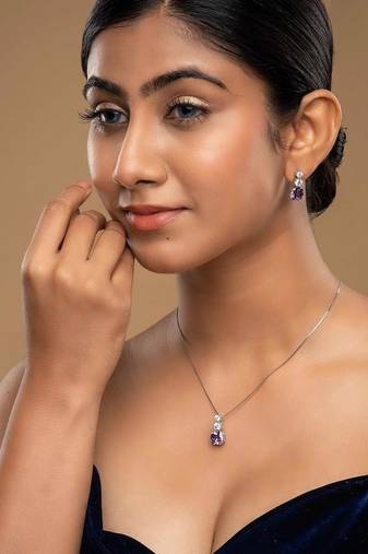 Silver plated blue stone pendant necklace set in sterling silver