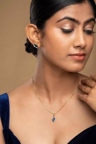 Gold plated blue stone pendant necklace set in sterling silver