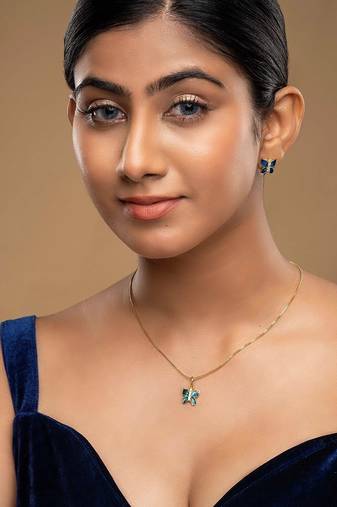 Gold plated blue stone pendant necklace set in sterling silver