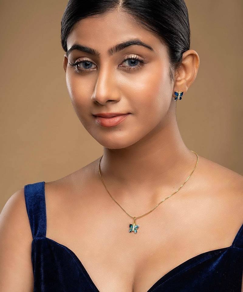 Gold plated blue stone pendant necklace set in sterling silver