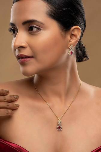 Gold plated pink stone pendant necklace set in sterling silver