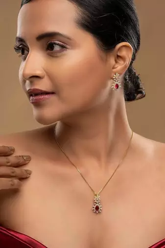 Gold plated pink stone pendant necklace set in sterling silver