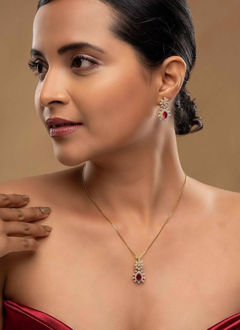 Gold plated pink stone pendant necklace set in sterling silver