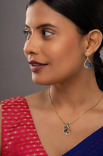 Gold plated blue stone pendant necklace set in sterling silver