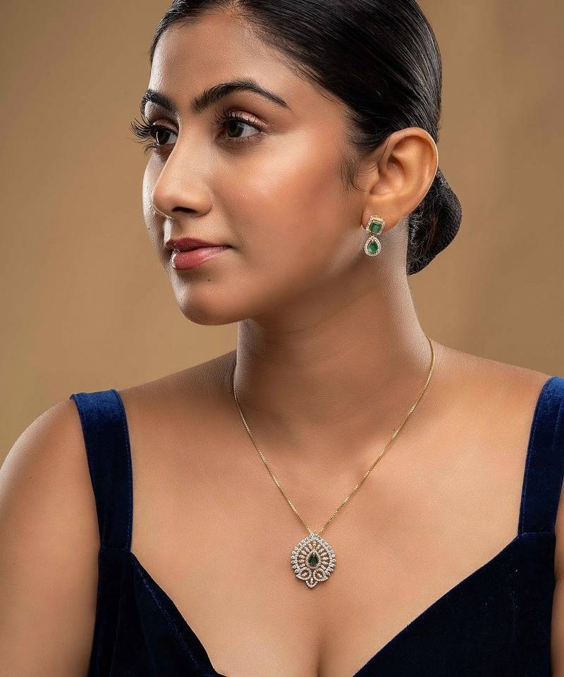 Gold plated green stone pendant necklace set in sterling silver