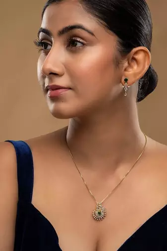 Gold plated green stone pendant necklace set in sterling silver